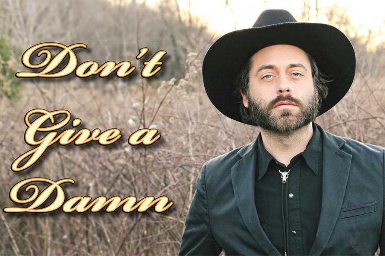 Don’t Give a Damn: Out country artist serves up striking sights and songs on new album