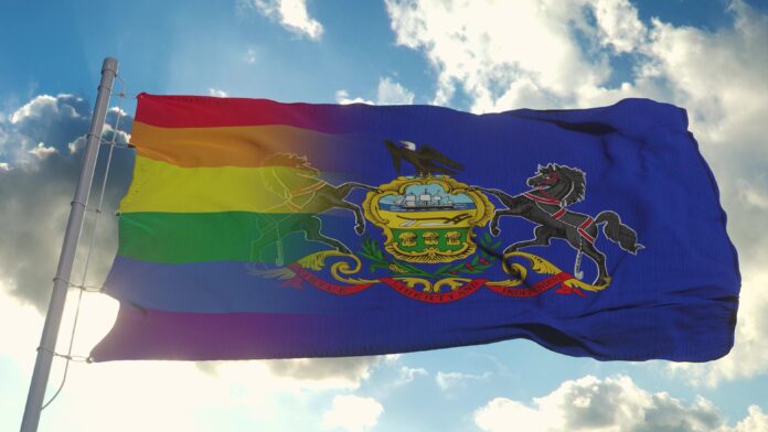 Adobe Stock Flag of Pennsylvania and LGBT. Pennsylvania and LGBT Mixed Flag waving in wind. 3d rendering rainbow PA