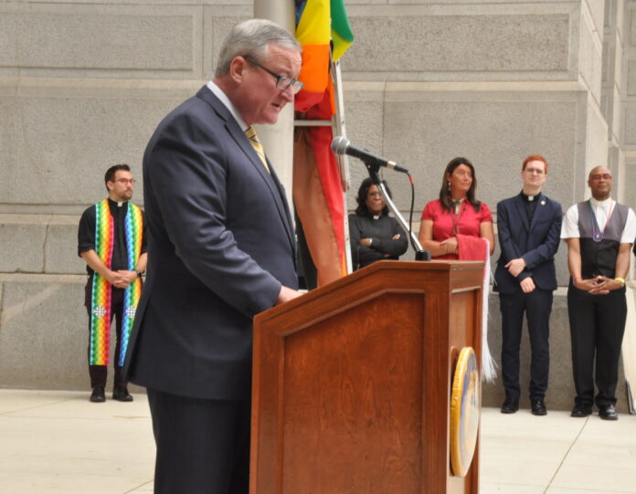Mayor Kenney speaking at the Pride flag raising at City Hall in 2017.