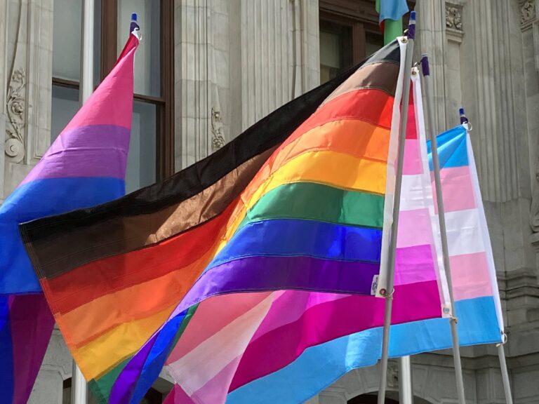 Pride flags wave in the wind
