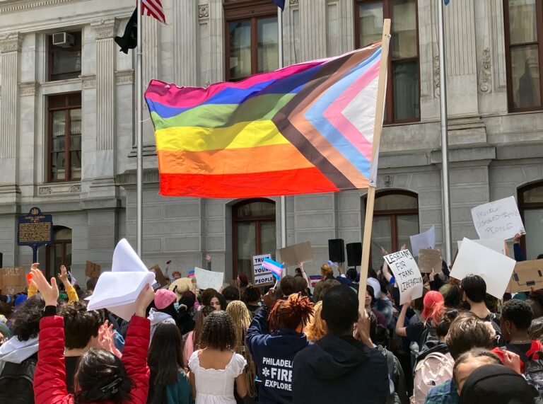 Trans youth and allies rally at City Hall in a student-organized effort to advocate for their rights.
