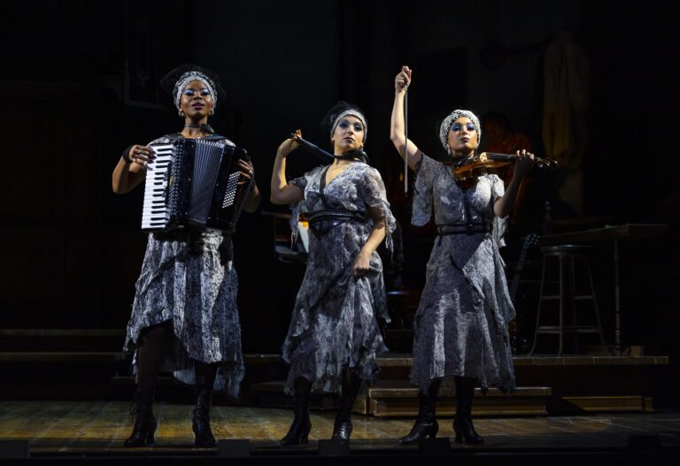 From left, Marla Louissaint, Lizzie Markson and Hannah Schreer in the ‘Hadestown’ North American Tour in 2023. The three actors are dressed in costume as the Fates.