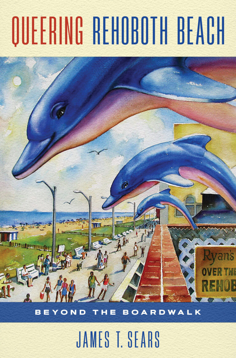 A colorful painted image of blue dolphin sculptures atop a building on the bustling boardwalk.