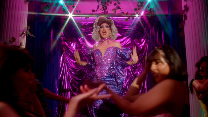 A drag queen dances in a scene from ‘Peccadillo,’ which is playing at the 2024 Philadelphia Latino Arts & Film Festival