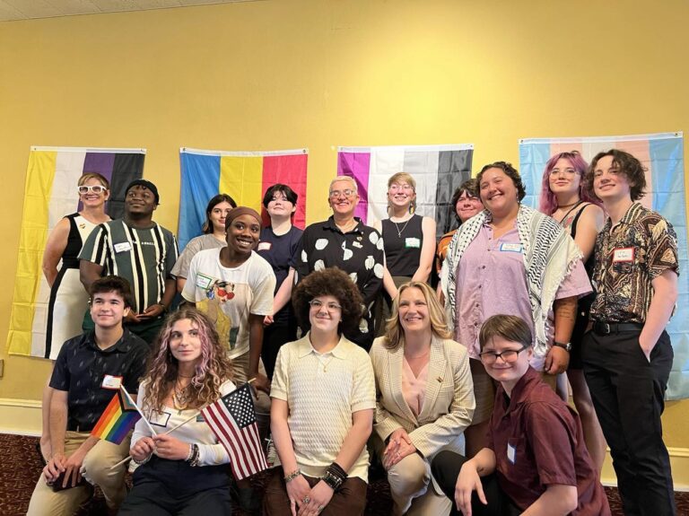 LGBTQ+ youth from the Rainbow Room pictured with Rainbow Room director Marlene Pray and Planned Parenthood Keystone CEO Melissa Reed.
