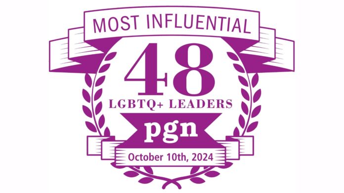 Logo for Philadelphia Gay News: 48 Most Influential LGBTQ+ Leaders for 2024. The image is a purple emblem or badge featuring the text "Most Influential 48 LGBTQ+ Leaders" at the center. The acronym "pgn" is displayed in a bold font below the text, followed by the date "October 10th, 2024." The design is circular with laurel leaves bordering the text, and the words "Most Influential" are placed inside a ribbon-like banner at the top of the badge.