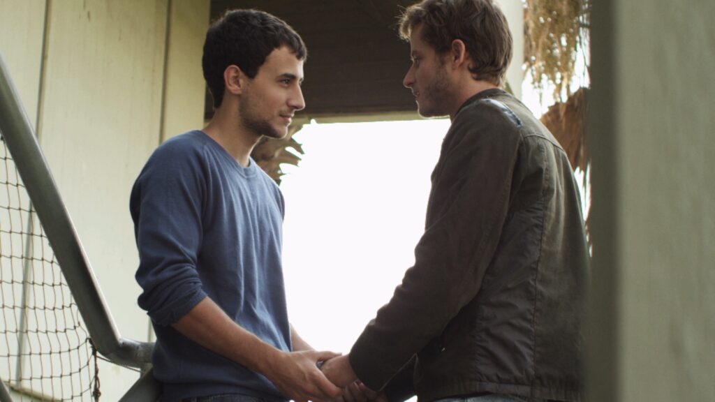 From left Michael Aloni and Nicholas Jacob in a scene from ‘Out in the Dark.’