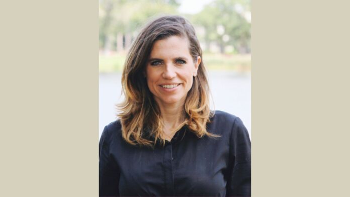 Nancy Mace smiles and wears a black shirt.